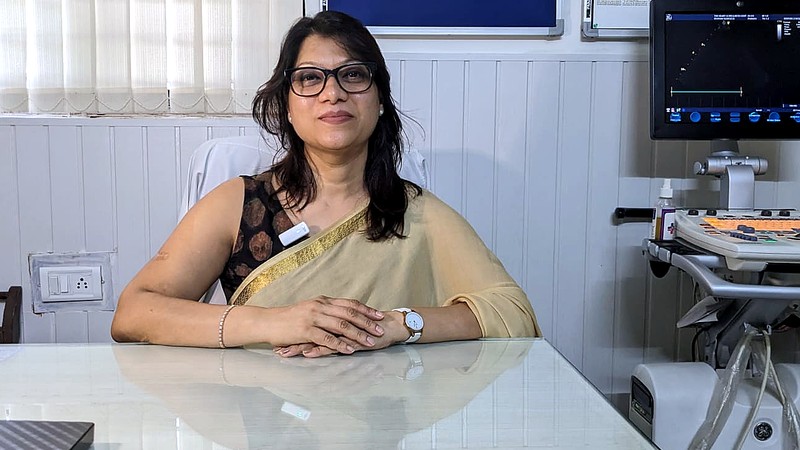 Dr. Ruchi Gupta with echocardiography equipment at clinic